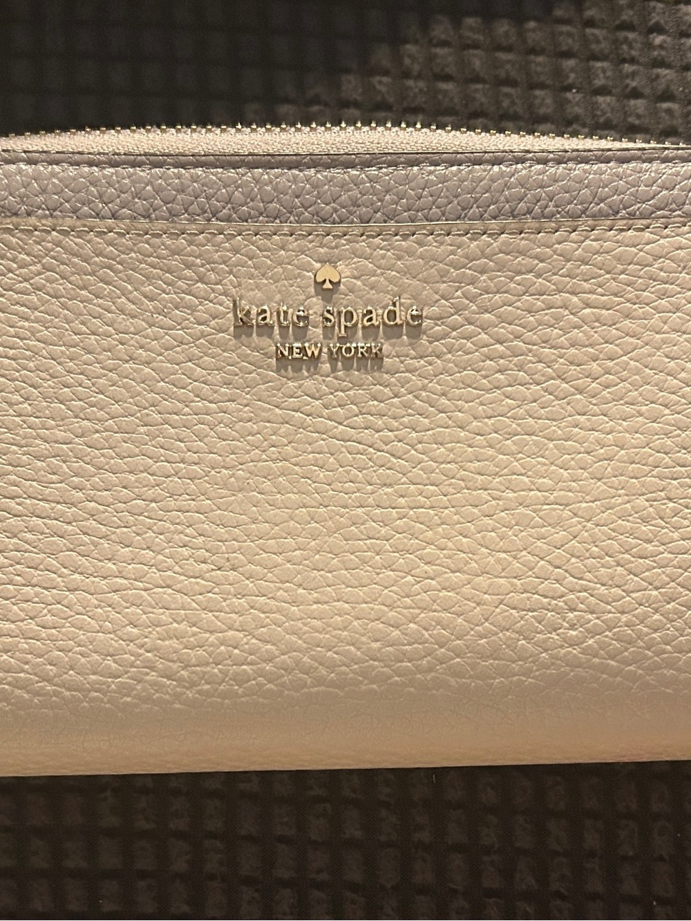 kate spade Cream Pebbled Leather Zip Wristlet with Gold Logo